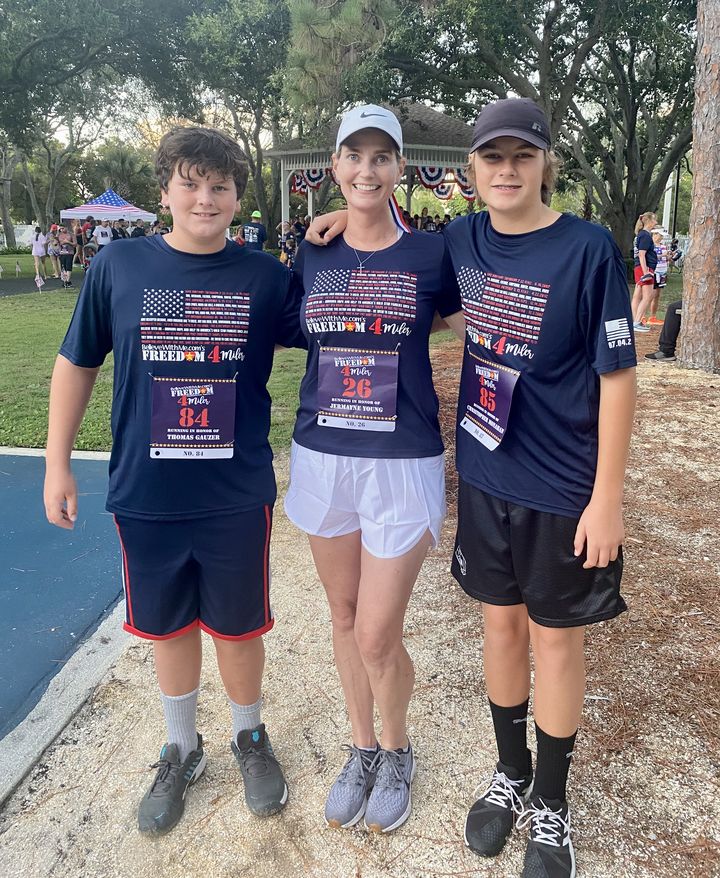 Kolleen C. Bannon with her two sons at a community race in Jupiter, Florida